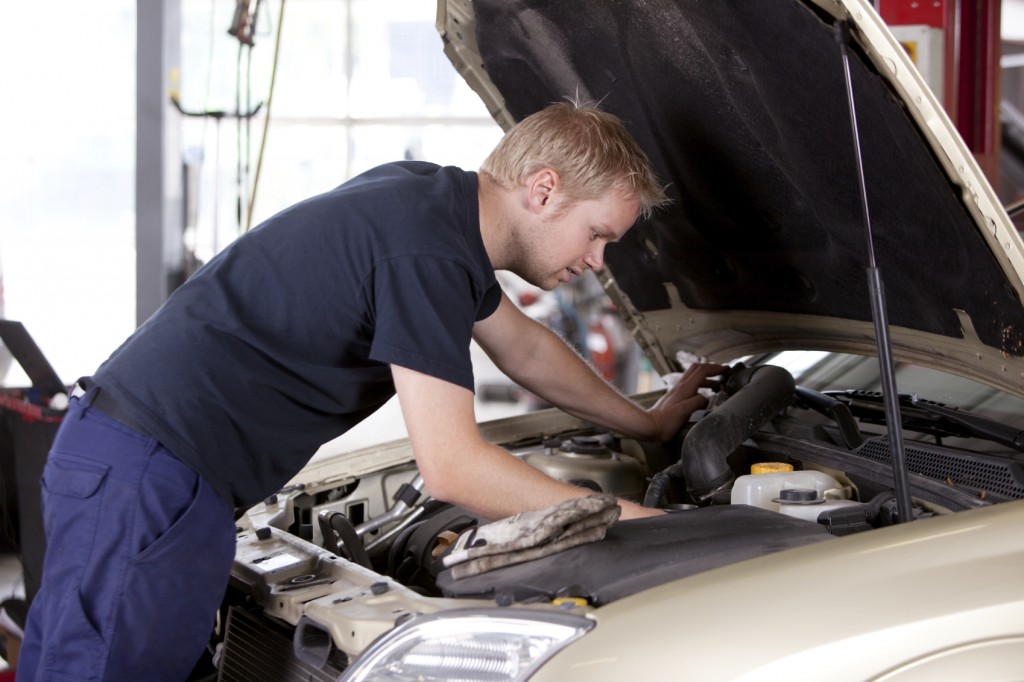 Mechanic Fixing Car